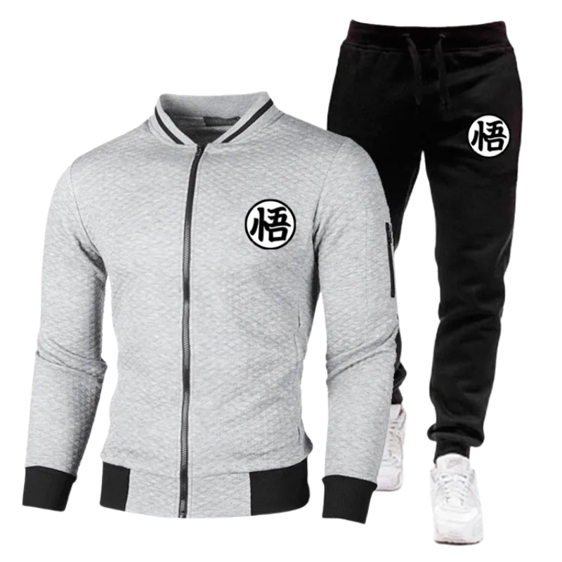 Tenue confortable comprenant une veste matelassée grise avec fermeture éclair et un pantalon jogging noir. Idéal pour les fans de Dragon Ball avec le symbole Goku emblématique."
Les mots-clés sélectionnés, tels que "veste matelassée grise", "jogging noir" et "Dragon Ball", aident à améliorer le référencement tout en ciblant les passionnés de la série.