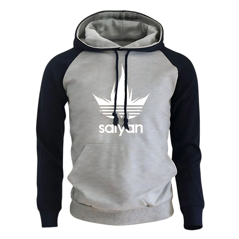 Sweat à capuche gris et navy avec logo Saiyan inspiré manga, manches contrastantes et design style streetwear, idéal pour les amateurs d'anime et de mode casual.