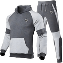 Ensemble de jogging et hoodie gris et anthracite, orné du symbole iconique de Goku. Confort et style pour les fans de Dragon Ball, parfait pour un look sportif et décontracté.