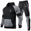 Ensemble confortable de hoodie à capuche et jogging noir et gris, orné du symbole emblématique de Goku. Inspiré de l'univers Dragon Ball, parfait pour les fans du manga.