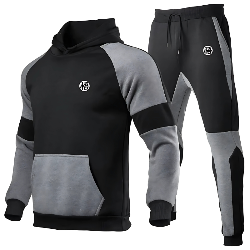 Ensemble confortable de hoodie à capuche et jogging noir et gris, orné du symbole emblématique de Goku. Inspiré de l'univers Dragon Ball, parfait pour les fans du manga.