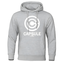 Sweat gris clair avec capuche, logo Capsule Corporation blanc sur la poitrine, design élégant inspiré de Dragon Ball Z.
