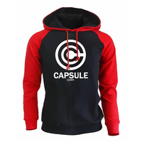 Sweat à capuche bicolore avec un corps noir et des manches rouges vibrantes. Le devant arbore fièrement le logo blanc Capsule Corp. Le hoodie est équipé d'une poche kangourou pratique et de cordons rouges assortis pour un style tendance, idéal pour les amateurs de mode geek et casual.