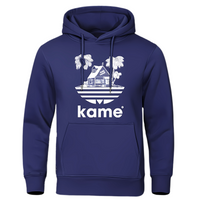 Sweat à capuche bleu marine avec logo blanc représentant la maison de Kame (Tortue Géniale) et des palmiers, design inspiré de l'univers Dragon Ball, parfait pour un look élégant et geek.