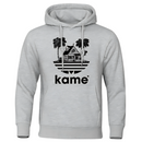 Sweat à capuche gris clair avec logo noir représentant la maison de Kame (Tortue Géniale) entourée de palmiers, design minimaliste inspiré de l'univers Dragon Ball, idéal pour un look casual et geek.