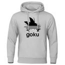  Sweat à capuche gris clair avec logo cheveux Saiyan noir et texte "Goku", parfait pour les amateurs de culture pop.