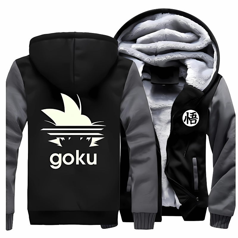 Veste polaire noire avec manches grises, design Goku inspiré de Dragon Ball et logo kanji "悟", capuche doublée en fourrure chaude, parfaite pour l’hiver et les fans de manga.