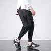 pantalon streetwear noir portefeuille profil droit