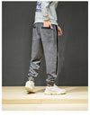 Pantalon Streetwear velour gris vintage vue de dos