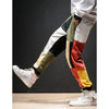 Pantalon Streetwear patchwork multicolore vue de profil