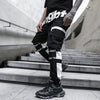 pantalon streetwear noir de profil