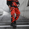 pantalon streetwear rouge de profil