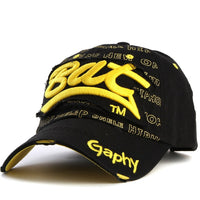 Casquette homme pas cher noir jaune vue de profil