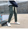Pantalon Streetwear cargo large homme vert vue de profil  droit