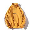 Pull Streetwear long oversize jaune vue de face
