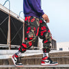 Pantalon Streetwear cargo camouflage rouge vue de profil