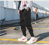 Pantalon Streetwear cargo homme noir vue de profil